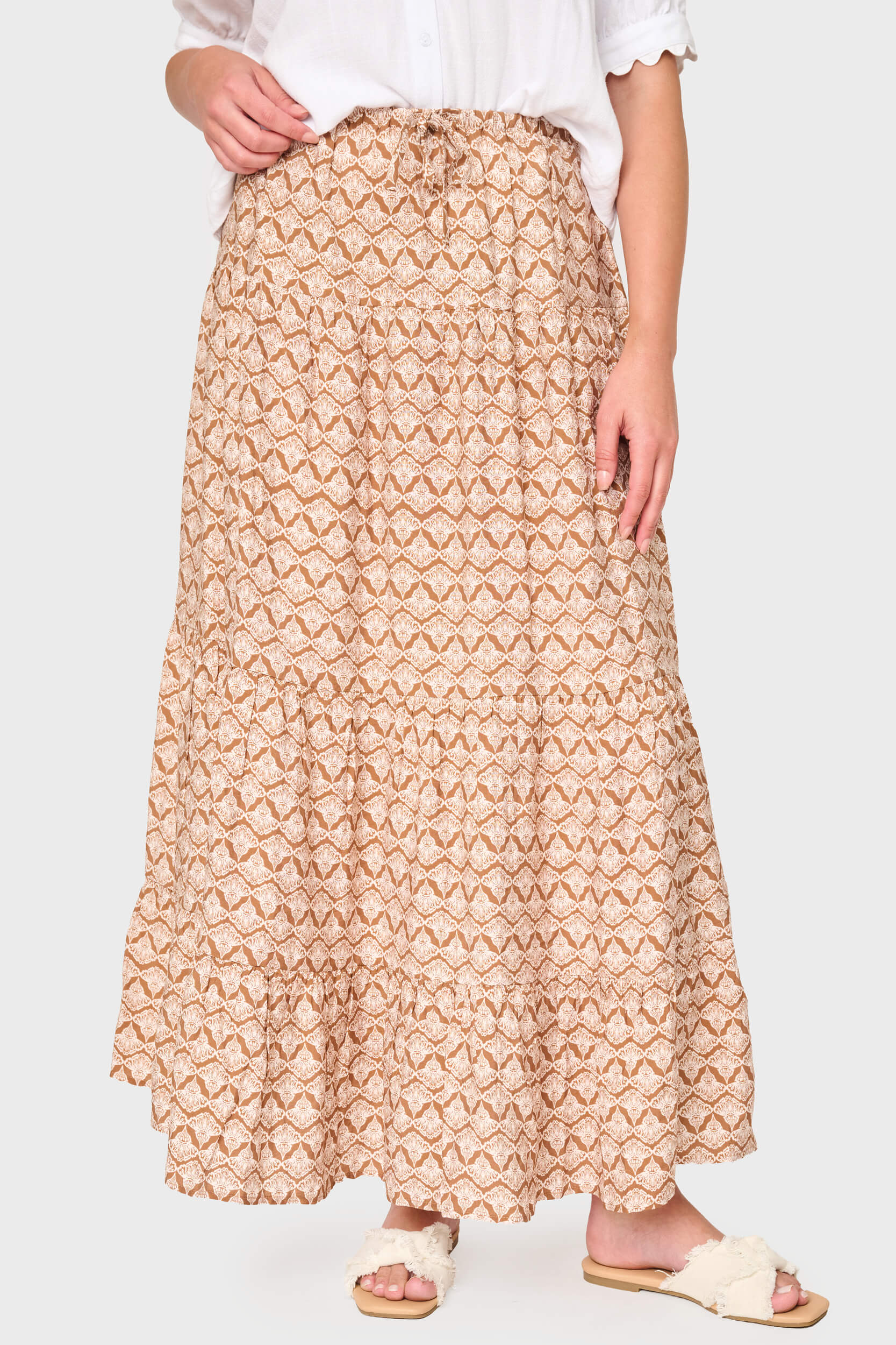 Woman modeling Tiered Ultra Maxi Skirt in Mocha Shell beige print styled for everyday