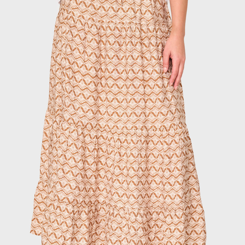 Woman modeling Tiered Ultra Maxi Skirt in Mocha Shell beige print styled for everyday
