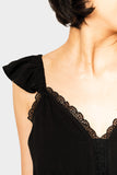 Close-up of women wearing the Strappy Crochet Inset Maxi Dress in black