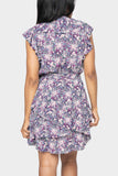 Back of women wearing the Ruffles For Days Wrap Dress With Belt in blue deco garden print