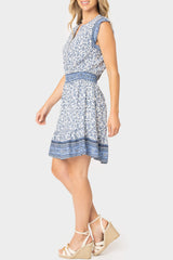 Side of women wearing the Lindsey Border Dress in navy white print