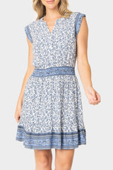Front of women wearing the Lindsey Border Dress in navy white print 