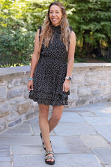 @themotherchic wearing the summer party dress