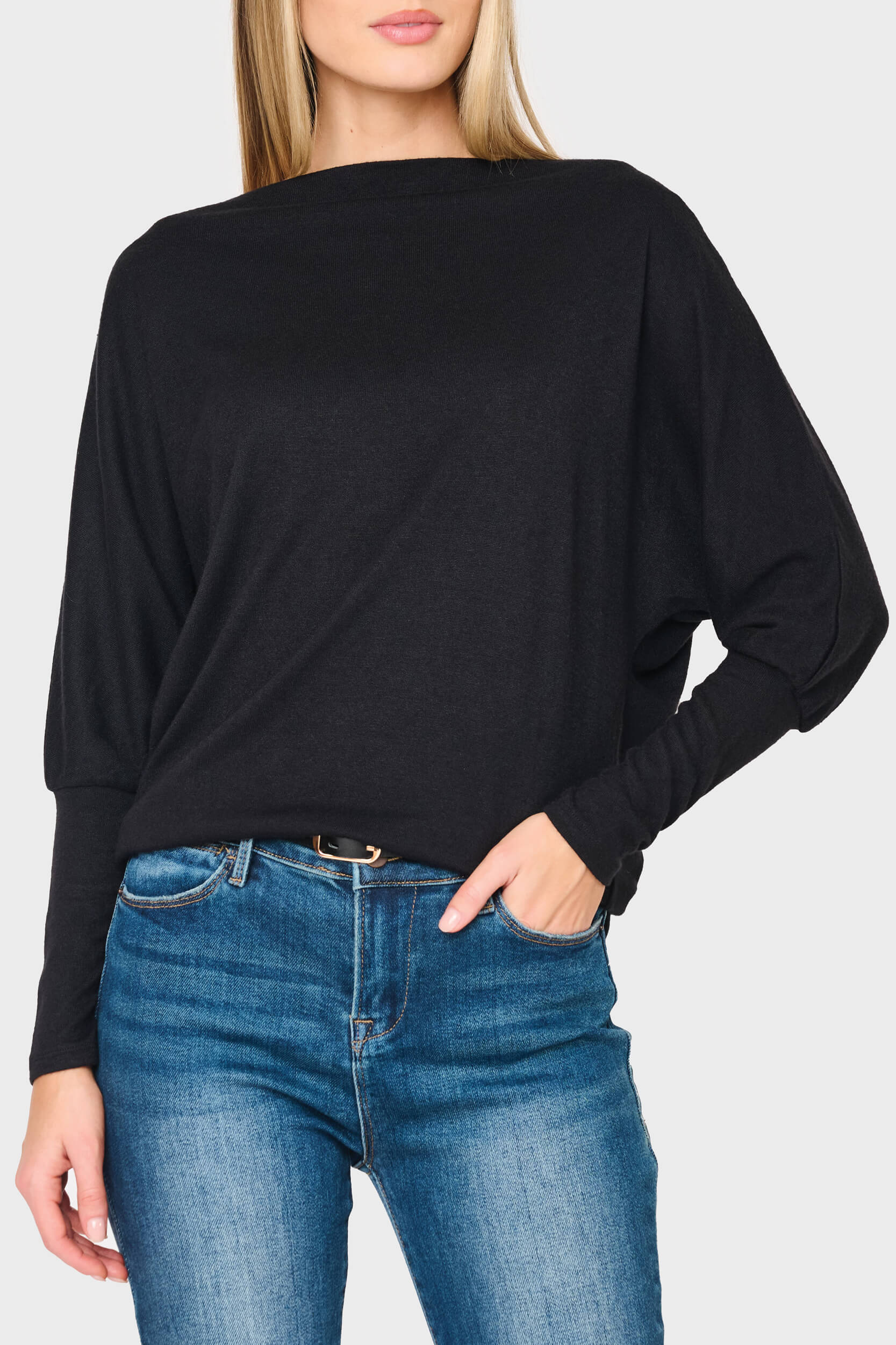 Woman modeling Slouchy Luxe Open Neck Sweater in Black styled business casual