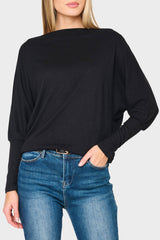 Woman modeling Slouchy Luxe Open Neck Sweater in Black styled business casual
