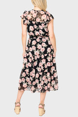Back of Woman modeling Sweetheart Pin Dot Flutter Sleeve Dress in Black Pink Floral styled business casual for work