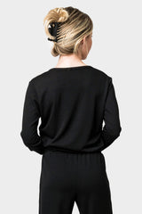 Back of Woman wearing Serene Mornings Henley Top in Black