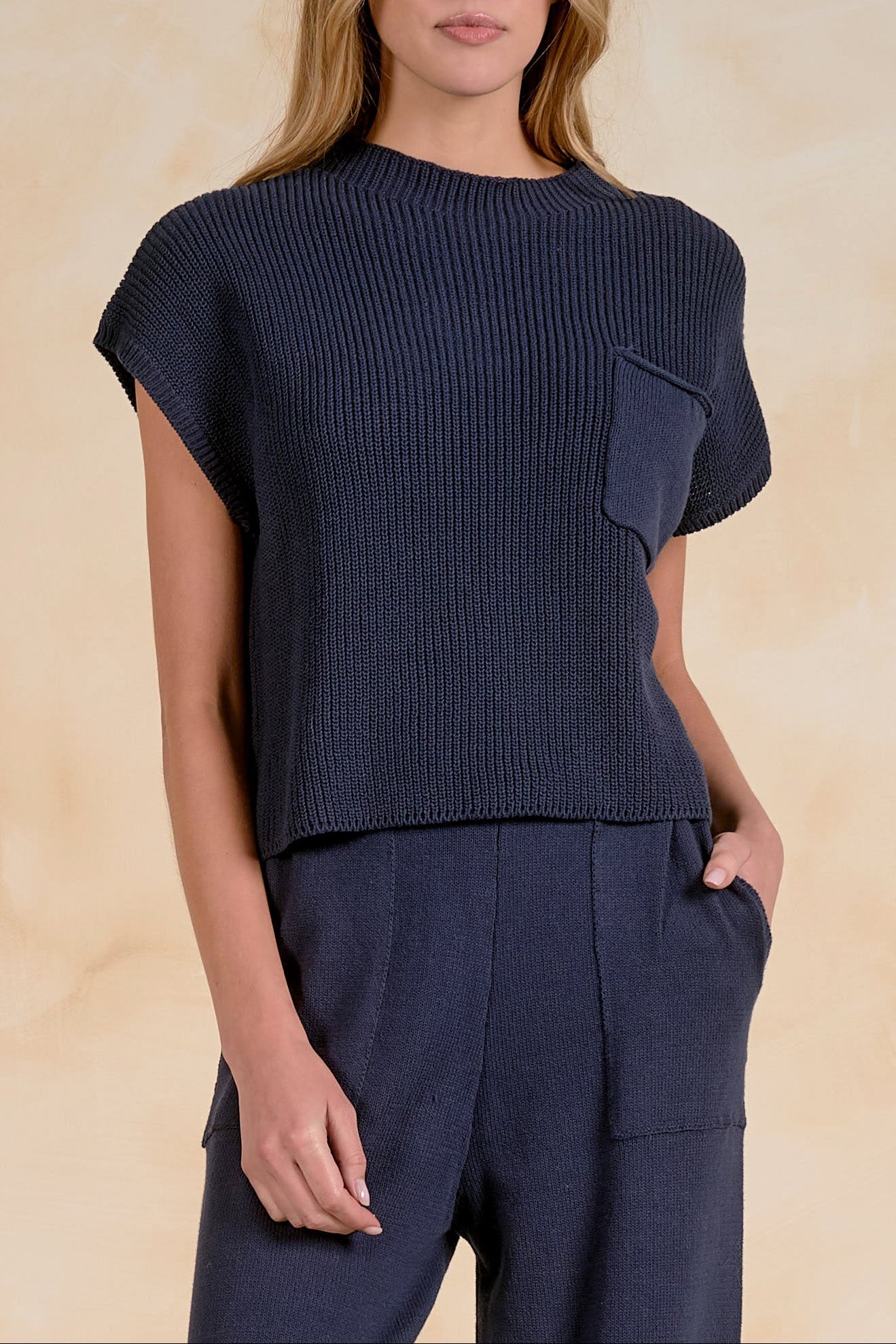 Woman modeling Elan Willow Sweater Navy styled as a set set for everyday casual