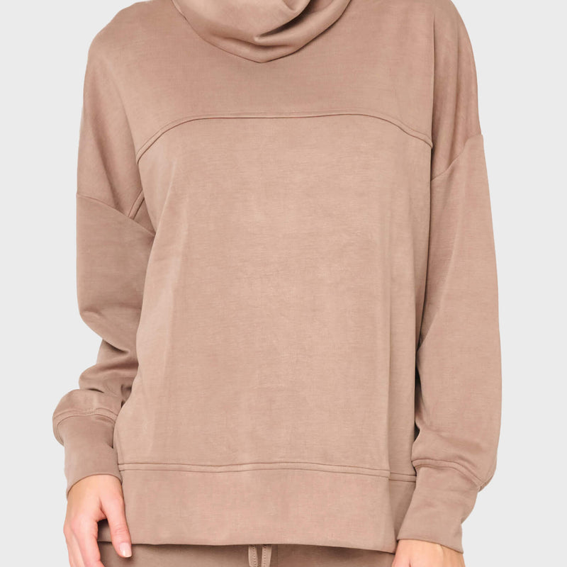 woman modeling cloud scuba mock neck top with matching pant styled for lounging