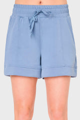 Woman wearing Cloud Scuba Everywhere Short in denim as a matching set for everyday