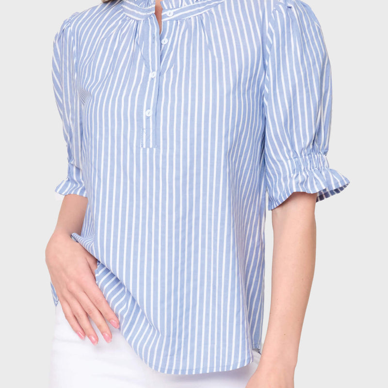 Model wearing Dianthus Henley Puff Sleeve Striped Blouse in Blue White stripe styled business casual