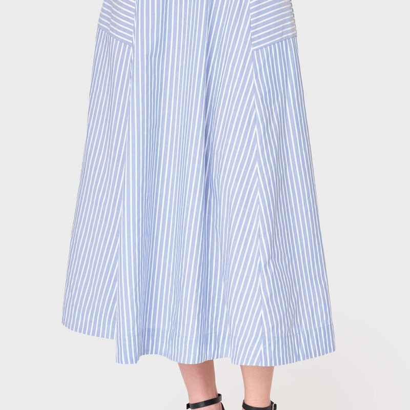 Woman modeling Amanda Smocked Back Midi Skirt in blue white stripe styled for work and weekends