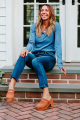 Picture of a Woman wearing a Thermal Long Sleeve Henley Tee Light Denim 