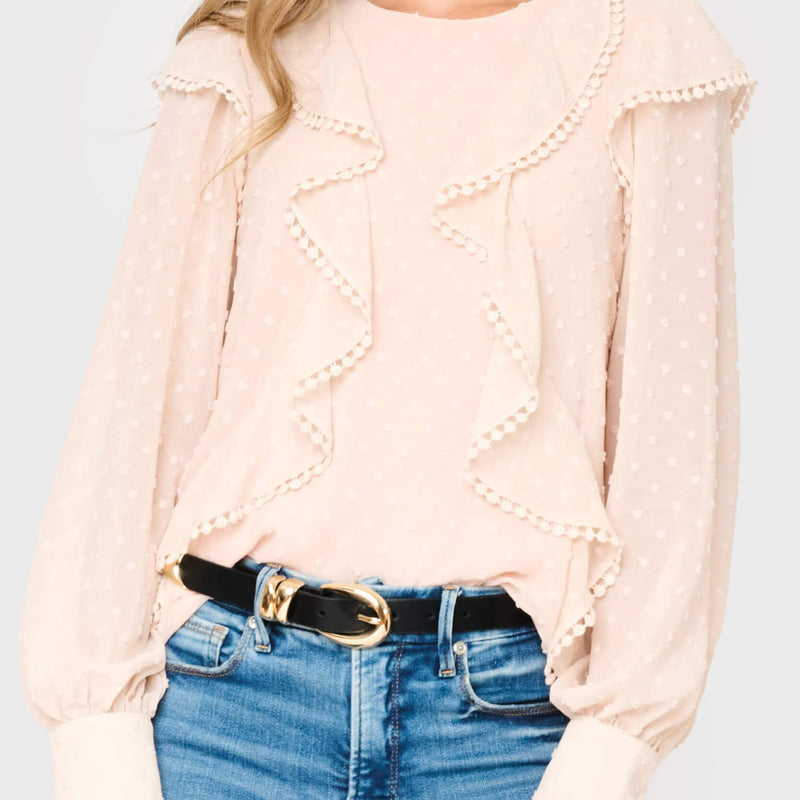 Woman modeling Ophelia Ruffle Boho Blouse in light pink styled business casual