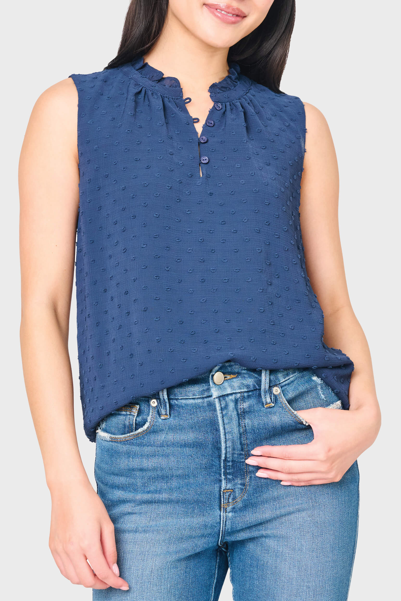 Woman modeling Respect the Ruffle Sleeveless Top in navy styled for everday - work to weekend