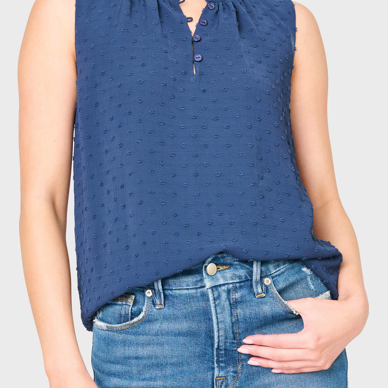 Woman modeling Respect the Ruffle Sleeveless Top in navy styled for everday - work to weekend