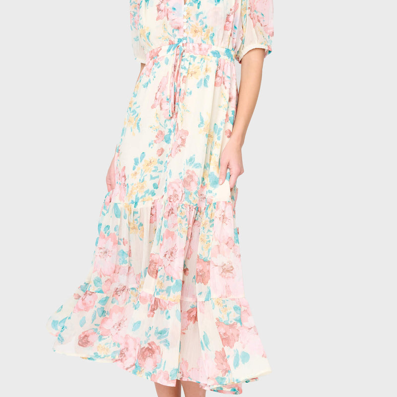 Woman modeling Kira Drawstring Midi Dress in Sunday Bouquet Floral print styled for work and weekends