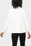 Back of Women Wearing Double Breasted Boucle Blazer in Off White