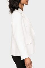 Side of Women Wearing Double Breasted Boucle Blazer in Off White