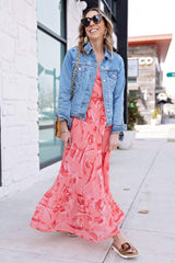 Front of Woman wearing Coral Pink Poppy Print Lindsey Flutter Sleeve Flowy Wrap Maxi Dress
