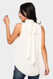 Back of Woman wearing Smocked Neck Chiffon Shell with Detachable Tie in Cream