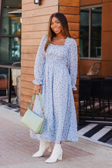 Front of Woman wearing Long Sleeve Square Neck Shirred Maxi Dress in Blue