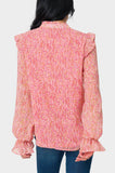 Back of Woman wearing Long Sleeve Ruffle Trim V-Neck Blouse in Pink Mini Floral Print