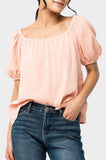 Front of Woman wearing Dusk To Dawn Off Shoulder Top in Sunset Coral