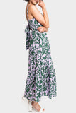 Side of Women Wearing Carmen Smocked Tie-back Maxi Dress in Peri Green Potager Print