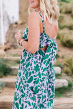 Cassie of Hi Sugarplum Wearing Carmen Smocked Tie-back Maxi Dress in Peri Green Potager Print