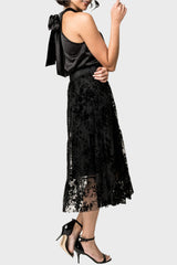 Side of Woman wearing Flocked Party Skirt in Black