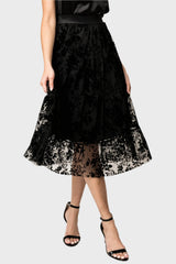 Front of Woman wearing Flocked Party Skirt in Black