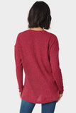 The Back of a Woman wearing a V-Neck Shimmer Tunic with High Low Hem Burgundy