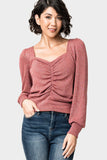 Front of Woman wearing Long Sleeve V-Neck Cinch Front Knit Top in Mauve