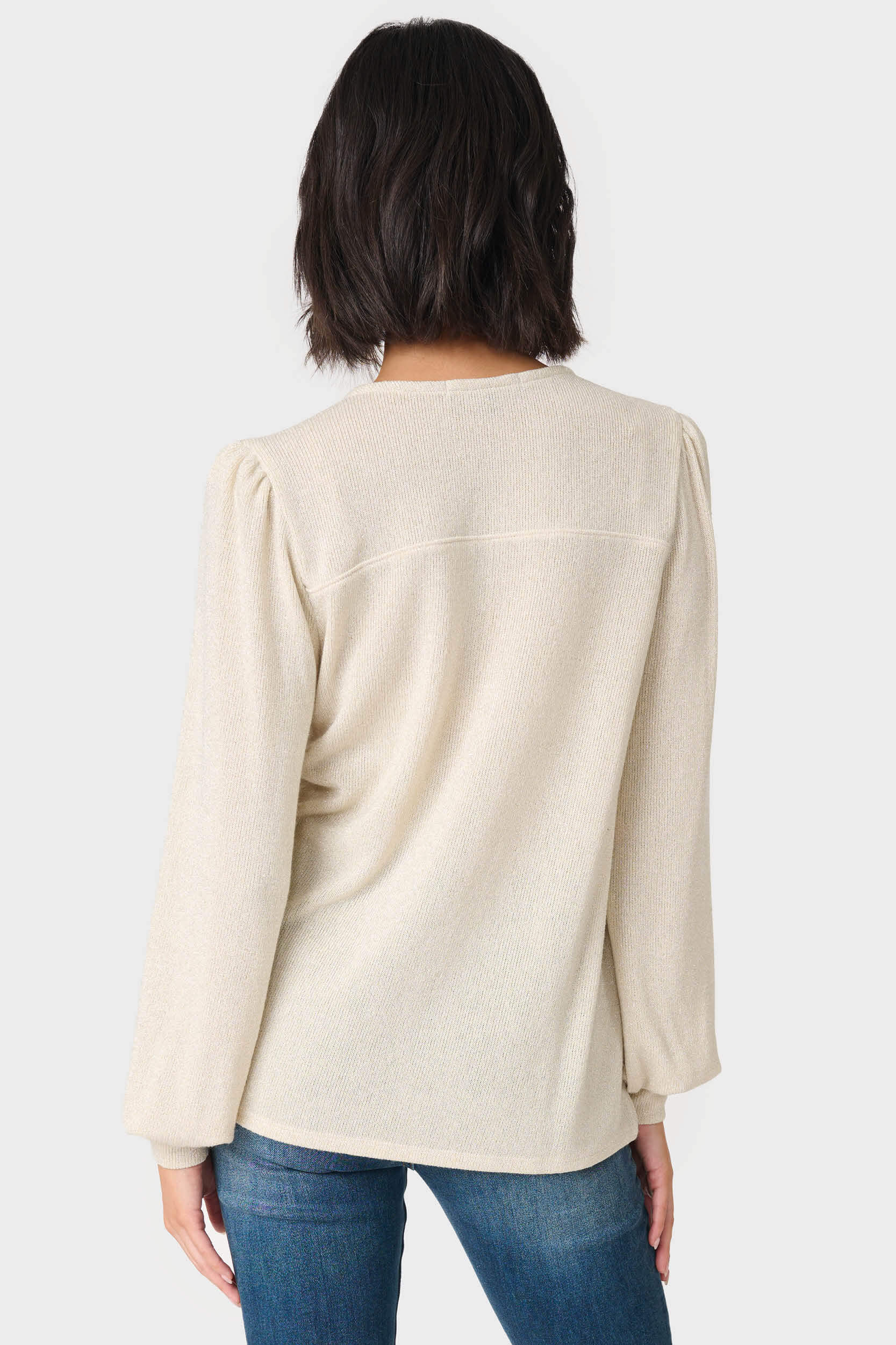 The Back of a Woman wearing V-Neck Blouson Sleeve Shimmer Top in Mauve