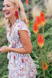Cassie of Hi Sugarplum Wearing Isla Smocked Waist Flutter Day Dress in Peruche Scroll Print