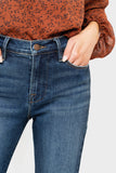 Close-up of Woman wearing Deep Blue Wash GIGI Denim Cropped Flare Pant