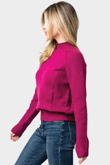 Side of Woman wearing Raglan Sleeve Mixed Media Mock Neck Sweater in Festival Fuchsia