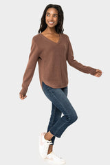 Front of Woman wearing V-Neck Ribbed Relaxed Sweater in Cinnamon
