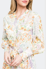 Close-up of Woman wearing Spring Wildflower Print Wildflower Blouson Long Sleeve Belted Tiered Dress