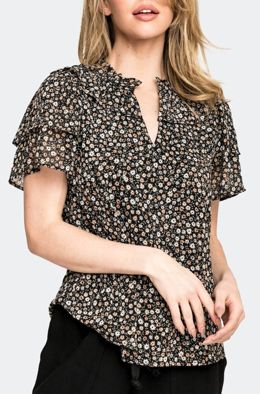 Front of Woman wearing Black Ditsy Dot Flutter Sleeve Chiffon Blouse