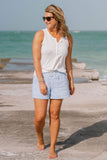 Front of Woman wearing White Marina Time Ribbed Henley Tank