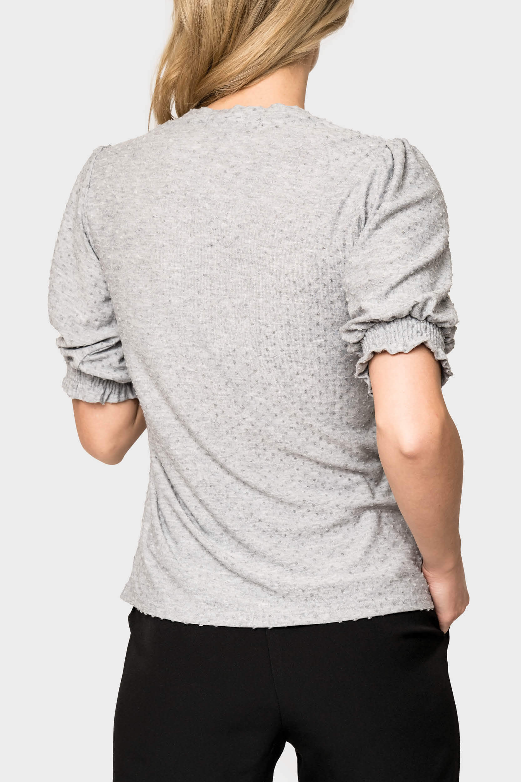 Back of Women Wearing Clip Dot Elbow Puff Sleeve V-Neck in Heather Grey