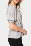 Side of Women Wearing Clip Dot Elbow Puff Sleeve V-Neck in Heather Grey