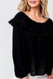 Close-up of Woman wearing Black Trimmed Collar Button Front Blouse