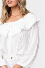 Close up of Woman wearing White Trimmed Collar Button Front Blouse