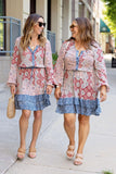 Front of two Women wearing Boho Mixed Print Drawstring Ruffle Dress