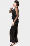 Side of Woman wearing Surplice Wrap Top with Organza Dot Sleeve in Black
