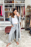 Women wearing Haute Off the Rack Cozy Fleece Long Belted Cardigan in grey. 