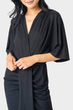 Close-up of Woman wearing Black Jennifer Drape Front Luxe Knit Surplice Dress